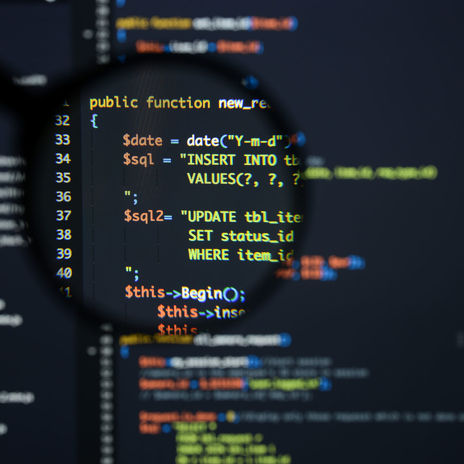 magnifying glass looking at SQL code